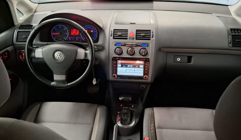 
								Volkswagen Touran completo									