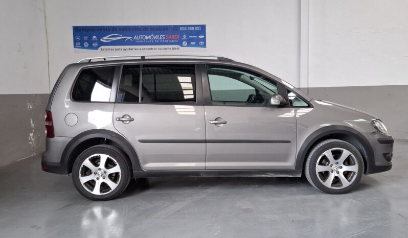 
								Volkswagen Touran completo									