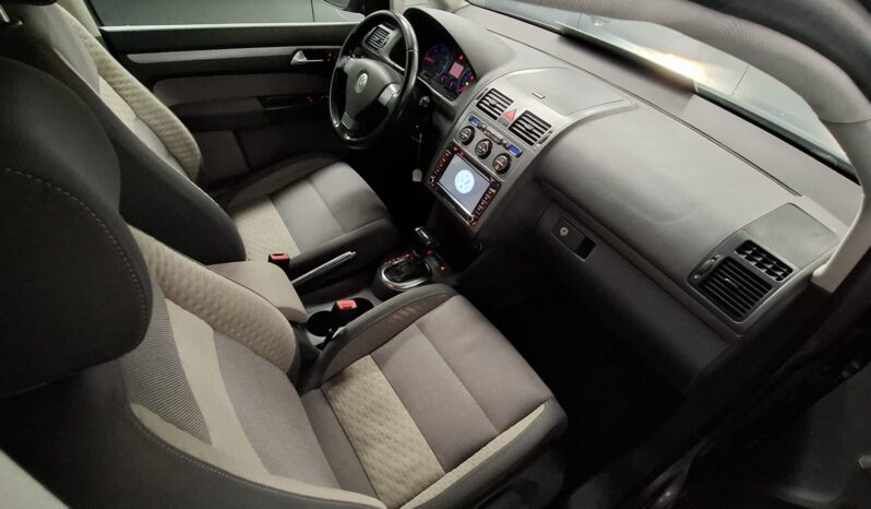 
								Volkswagen Touran completo									