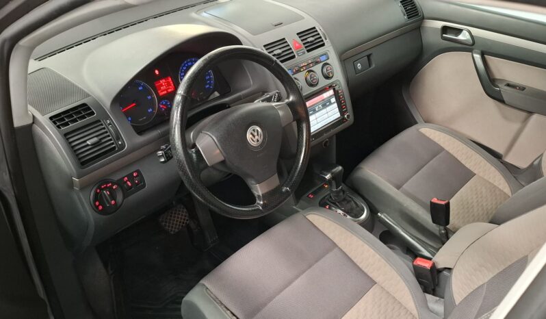 
								Volkswagen Touran completo									