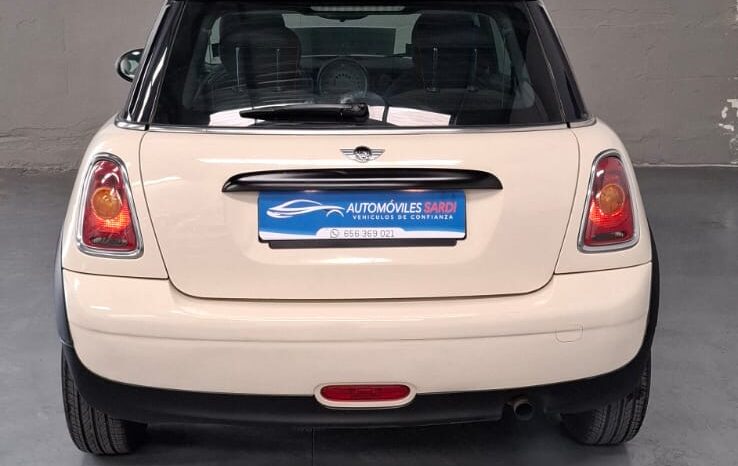 
								Mini Cooper One completo									