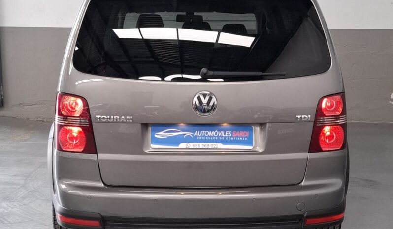 
								Volkswagen Touran completo									