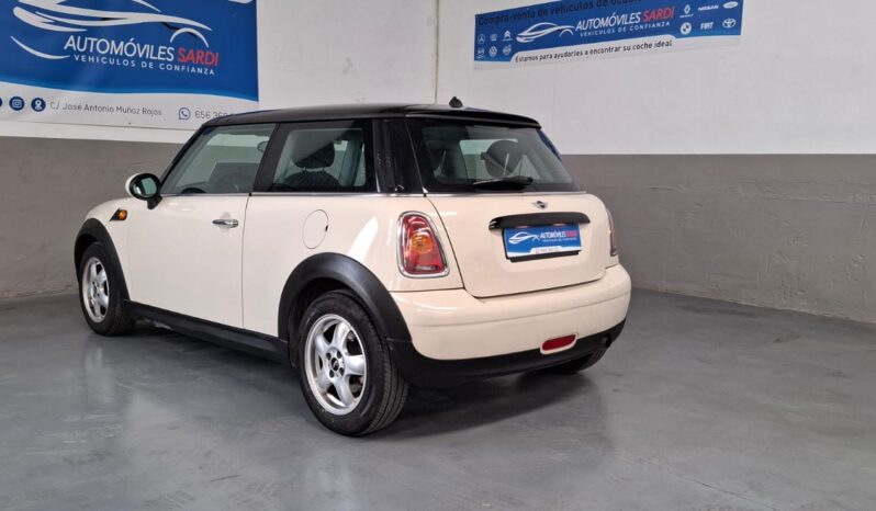 
								Mini Cooper One completo									